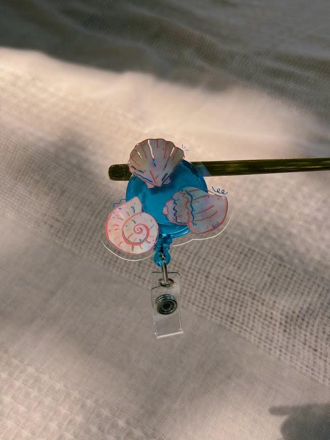 Seashells Badge Reel